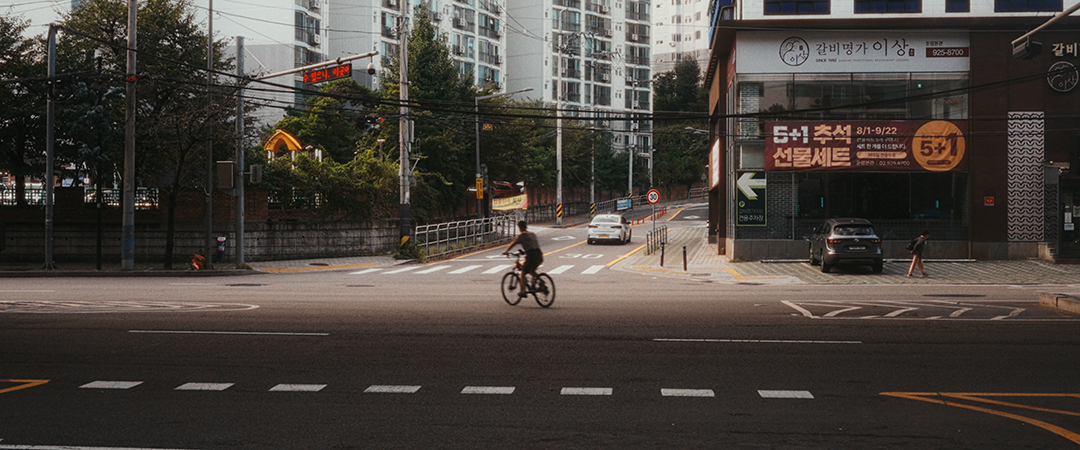 Biking down a big boulevard
